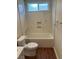 Well-lit bathroom featuring a shower-tub combination and a built-in niche for toiletries at 8641 Surtidor Dr, Las Vegas, NV 89117