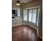 Dining area features wood floor and bay windows with shutters, providing natural light at 8641 Surtidor Dr, Las Vegas, NV 89117