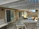 Covered patio with seating at 8641 Surtidor Dr, Las Vegas, NV 89117