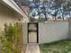 Side yard with block fencing for privacy and xeriscape landscaping at 8641 Surtidor Dr, Las Vegas, NV 89117