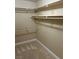 Spacious walk-in closet with multiple shelves and rods for optimal organization and storage at 8641 Surtidor Dr, Las Vegas, NV 89117