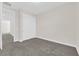 Bright bedroom features sliding closet doors, plush carpet, and neutral paint at 9176 Bluebell Knoll Ct, Las Vegas, NV 89178