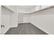 A large walk-in closet with shelves and racks offers ample storage space at 9176 Bluebell Knoll Ct, Las Vegas, NV 89178