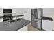 Stylish kitchen with stainless steel appliances, a large island, and modern fixtures at 9176 Bluebell Knoll Ct, Las Vegas, NV 89178