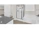 Spacious main bathroom with a walk-in shower and tub, featuring modern fixtures at 9176 Bluebell Knoll Ct, Las Vegas, NV 89178