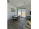 Open-concept dining room adjacent to the kitchen with plenty of natural light at 928 Woodburn Ln, Las Vegas, NV 89138