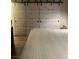 Bedroom shows custom closet doors and updated flooring at 9325 W Desert Inn Rd # 174, Las Vegas, NV 89117