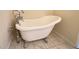 Bathroom featuring a claw foot tub with chrome fixtures on marble tile floors at , Las Vegas, NV 89103