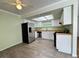 Kitchen featuring stainless steel refrigerator, white cabinets, wood countertops, and gray wood-look floors at , Las Vegas, NV 89103
