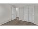Neutral bedroom with closet and an open doorway to the ensuite bathroom at 10160 W Meranto Ave, Las Vegas, NV 89178