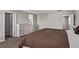 Large bedroom with a dresser and access to an ensuite bathroom at 10160 W Meranto Ave, Las Vegas, NV 89178