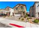 Charming two-story home with stone accents and a two-car garage at 10160 W Meranto Ave, Las Vegas, NV 89178