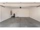 Spacious garage with epoxy flooring, offering ample parking and storage at 10160 W Meranto Ave, Las Vegas, NV 89178