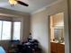 Bedroom has natural light and is connected to a bathroom with vanity and a glass-enclosed shower at 11031 Mission Lakes Ave, Las Vegas, NV 89134