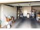 Spacious garage interior with ample storage cabinets and plenty of room for parking and projects at 11031 Mission Lakes Ave, Las Vegas, NV 89134
