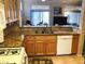 Features included granite counters, double sink, updated cabinets and breakfast bar at 11031 Mission Lakes Ave, Las Vegas, NV 89134