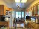 Well-equipped kitchen with modern appliances, granite counters, and a bright breakfast nook at 11031 Mission Lakes Ave, Las Vegas, NV 89134