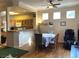 Open living area with wood floors, recessed lighting, and an adjacent kitchen at 11031 Mission Lakes Ave, Las Vegas, NV 89134