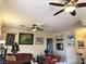 Comfortable living room featuring neutral colors, golf decor, and an open layout at 11031 Mission Lakes Ave, Las Vegas, NV 89134