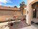 A relaxing patio for outdoor seating. This home offers a perfect blend of indoor and outdoor living at 11031 Mission Lakes Ave, Las Vegas, NV 89134