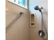 Close up of shower featuring adjustable shower head, and built in soap and shampoo tray at 11031 Mission Lakes Ave, Las Vegas, NV 89134