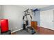 Exercise room with home gym equipment and wood flooring at 11620 Longhirst Hall Ln, Las Vegas, NV 89138