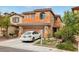 Charming two-story home features a well-maintained front yard and attached two-car garage at 11620 Longhirst Hall Ln, Las Vegas, NV 89138