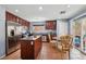 Well-equipped kitchen with stainless steel appliances, granite countertops, and a center island at 11620 Longhirst Hall Ln, Las Vegas, NV 89138