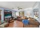 Comfortable living room features stylish decor, tile floors, and ample natural light at 11620 Longhirst Hall Ln, Las Vegas, NV 89138