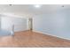 Upstairs loft area with wood floors, neutral walls, and natural light at 11673 Pride Hill St, Las Vegas, NV 89183