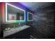Modern bathroom features a granite countertop and stone shower at 120 Chartan Ave, Las Vegas, NV 89183
