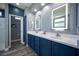 Elegant bathroom with dual sinks, vanity, and modern fixtures, providing comfort and style at 120 Chartan Ave, Las Vegas, NV 89183