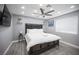 Bright bedroom features a ceiling fan and hardwood floors at 120 Chartan Ave, Las Vegas, NV 89183