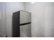 Kitchenette with stainless steel refrigerator, and neutral walls at 120 Chartan Ave, Las Vegas, NV 89183