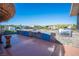 Inviting outdoor kitchen with stainless steel appliances and stone accents, perfect for entertaining at 120 Chartan Ave, Las Vegas, NV 89183