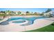 Stunning in-ground pool and spa with lush landscaping, creating a backyard oasis at 120 Chartan Ave, Las Vegas, NV 89183