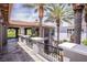 Stunning exterior view showcasing the home's architecture, tiled roof, and lush landscaping at 12097 Oakland Hills Dr, Las Vegas, NV 89141