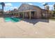 Inviting backyard with a sparkling pool and covered patio, perfect for outdoor entertaining at 132 Montclair Dr, Henderson, NV 89074