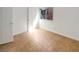 Minimalist bedroom featuring tile flooring, white walls, and natural light at 132 Montclair Dr, Henderson, NV 89074