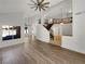 Spacious living room features beautiful wood floors and staircase to the second level at 132 Montclair Dr, Henderson, NV 89074
