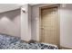 Condo entrance with stylish patterned carpet and unit number plaque by the door at 150 Las Vegas Blvd # 918, Las Vegas, NV 89101