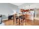 Beautiful open kitchen with stainless steel appliances, wood cabinetry, and bar-stool seating at 150 Las Vegas Blvd # 918, Las Vegas, NV 89101