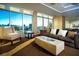 Bright living room with a view of the city skyline and comfortable seating at 150 Las Vegas Blvd # 918, Las Vegas, NV 89101