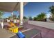 Rooftop terrace featuring stylish lounge chairs, green plants, and beautiful city views at 150 Las Vegas Blvd # 918, Las Vegas, NV 89101