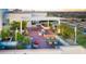 Expansive rooftop terrace with stylish pergola, lush landscaping, and stunning city views at 150 Las Vegas Blvd # 918, Las Vegas, NV 89101