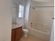 Bathroom with a shower-tub combo and a vanity with a single sink at 1820 Peridot Point St, Las Vegas, NV 89106