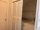 Convenient laundry area with modern washer and dryer units, neatly organized at 1820 Peridot Point St, Las Vegas, NV 89106