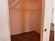 A walk-in closet featuring metal shelving and carpeted floors at 1820 Peridot Point St, Las Vegas, NV 89106