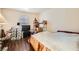 Simple bedroom featuring a bed, window, and storage items, ready for personalization and comfortable living at 1830 N Pecos Rd # 137, Las Vegas, NV 89115