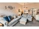 Inviting living room with comfortable seating, stylish decor, and open layout, great for entertaining and relaxing at 209 Crosswind Way, Las Vegas, NV 89145